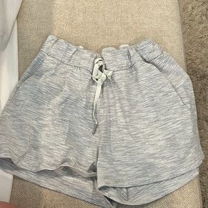 Grey and white strip pattern shorts